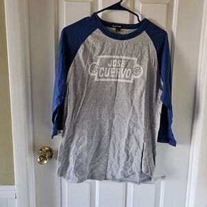 Jose Cuervo long sleeve top. Two toned gray and white writing and blue sleeves